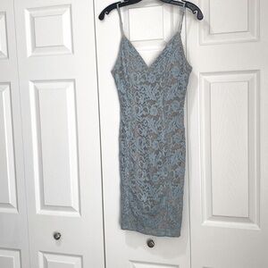 Short fitted lace light blue and nude dress